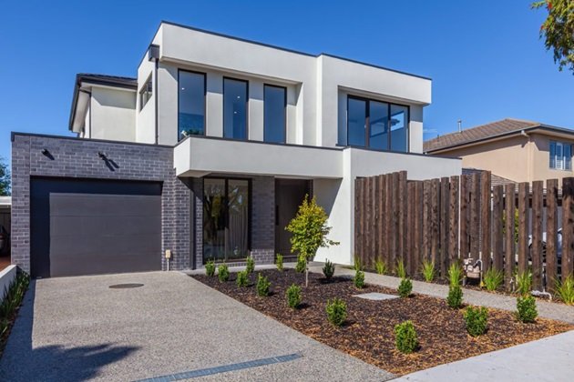 Well-maintained concrete driveway showcasing its long-term durability and appearance