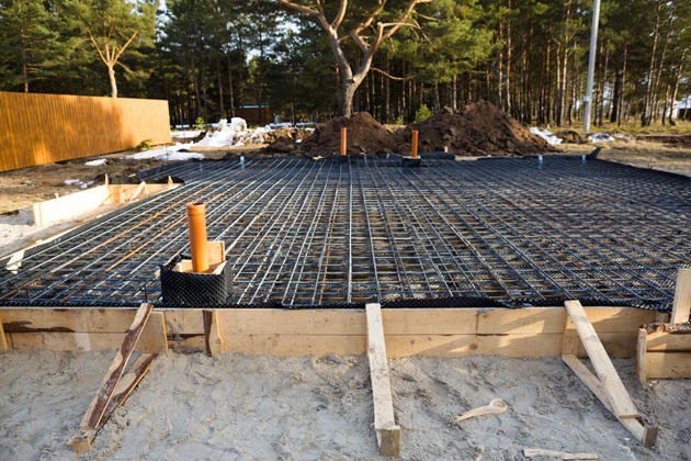 Close-up of steel reinforcement bars in a concrete slab before pouring