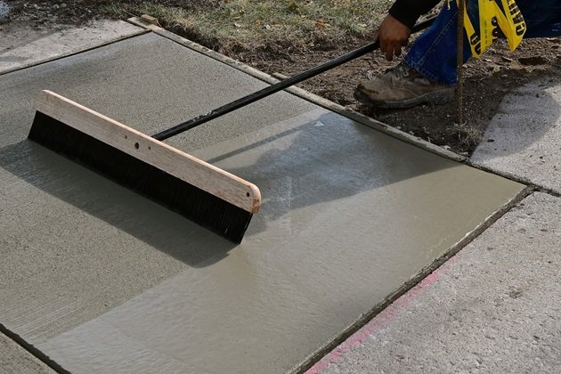 Before and after images of a concrete crack repair in Maitland